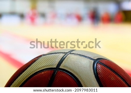 detail of basketball on the playing field. High quality photo