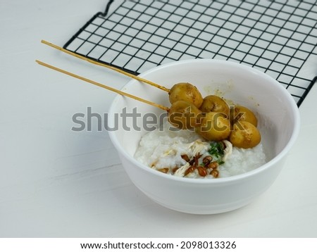 rice porridge in a bowl, on the table for breakfast in the morning.