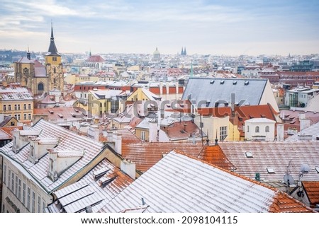 Panorama of Prague roofs covered with snow in winter, Czech Republic. High quality photo