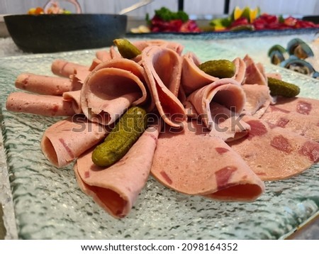 Smoked sausage slices, thinly sliced sausage in restaurant for breakfast
