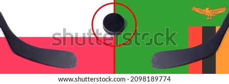 Top view hockey puck with Poland vs. Zambia command with the sticks on the flag. Concept hockey competitions
