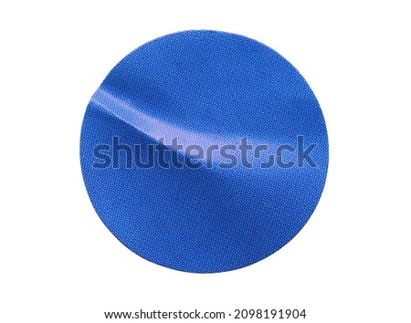 Blank blue round adhesive paper sticker label isolated on white background