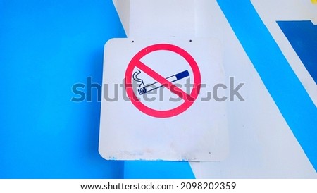 no smoking symbol on the wall