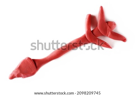 Plasticine for modelling in shape cupid's arrow isolated on white, top view  