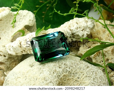 earth mined natural green sapphire gemstone square shape cutting for gems jewellery. Royalty-Free Stock Photo #2098248217