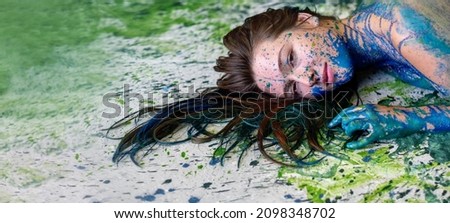 panorama abstract art portrait of a seductive young brunette redhead woman, dots of blue and green color, decorative, creative expressive abstract body painting art banner, make up, copy space. Royalty-Free Stock Photo #2098348702