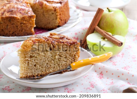 Wholemeal apple cinnamon tea cake Royalty-Free Stock Photo #209836891