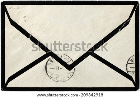 Closeup view of old used postal cover with ancient postmarks, circa 1912.