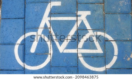 a symbol on a special road for cyclists