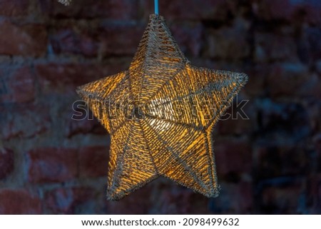 glowing braided star close up photo