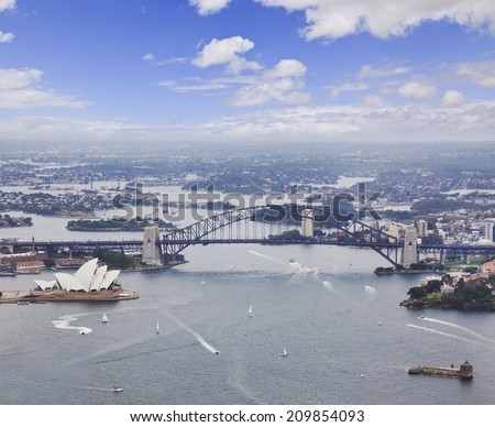 Australia NSW Sydney City landmarks including aerial view on harbour and the bridge day time summer helicopter flight