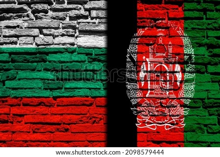 Background with flag of Bulgaria and Afghanistan on a brick wall