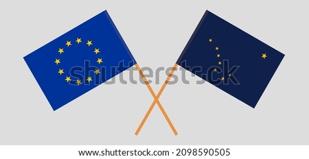 Crossed flags of the European Union and the State of Alaska. Official colors. Correct proportion. Vector illustration
