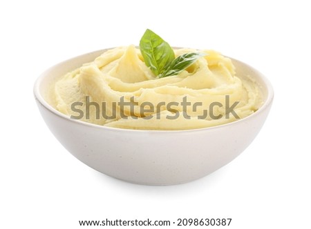 Bowl with tasty mashed potatoes on white background Royalty-Free Stock Photo #2098630387