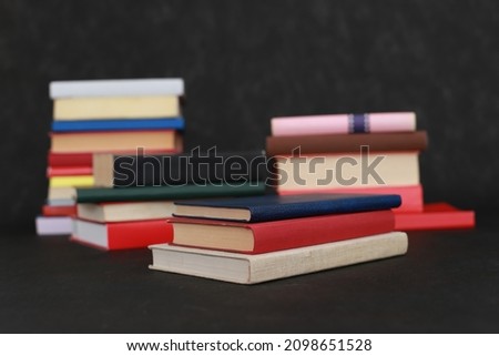 Stack of books on black background