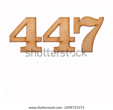 Number 447 - Piece of wood isolated on white background
