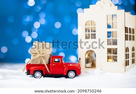 Home delivery concept. Delivery of gifts in winter for Christmas and New Year. Sales, shopping.
