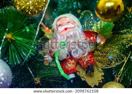 christmas tree decorations, santa toy on a christmas tree