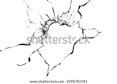 Texture of broken glass on a white background. Black cracks of a broken window