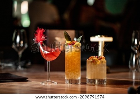 Classic restaurant cocktails in restaurant setting Royalty-Free Stock Photo #2098791574