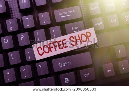 Hand writing sign Coffee Shop. Word Written on a restaurant that primarily serves coffee, and light meals Creating Social Media Comment Message, Typing Fun Questions And Answers
