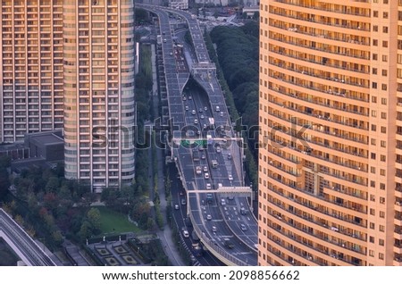  The view of the wide Kaigan dori motorway among the skyscrapers of Shinbashi. Tokyo. Japan