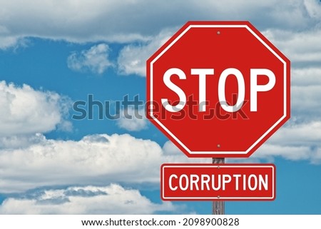 Stop Corruption Sign - Blue Sky Background