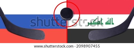 Top view hockey puck with Russia vs. Iraq command with the sticks on the flag. Concept hockey competitions