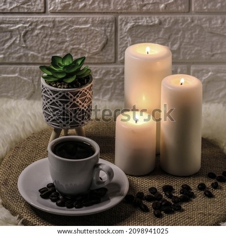 Coffee Still live picture with three candles and warm lighting 