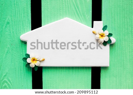 Address tag on wooden.