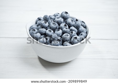 Blueberry antioxidant organic superfood in a bowl concept for healthy eating and nutrition 