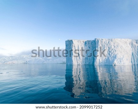 Arctic glaciers in ocean, Greenland Royalty-Free Stock Photo #2099017252