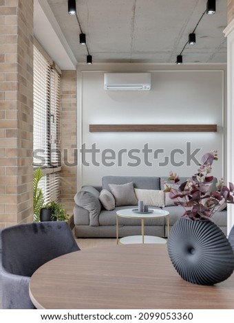 Scandinavian style interior with flowers in the foreground 