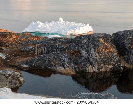 Arctic Iceberg on arctic ocean, Ilulissat, Greenland.