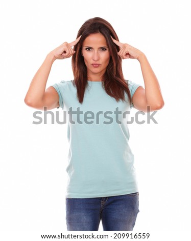Portrait of reflective pretty girl on blue jeans standing and looking at you on isolated white background