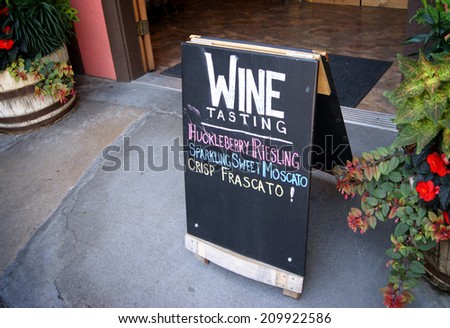 wine tasting sign in front of winery