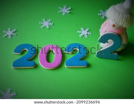 Concept 2022 year with snow man