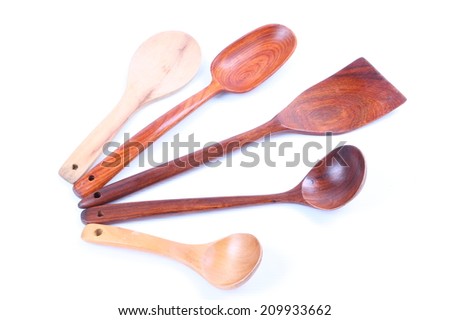 Group of wooden spoons isolated on white background