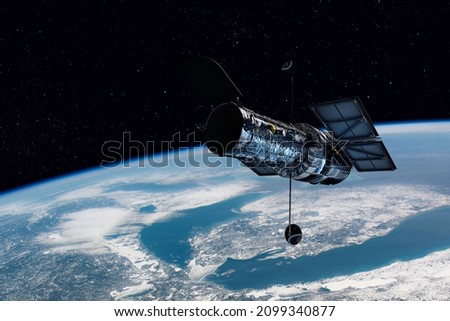 The Hubble Space Telescope is a space telescope that was launched into low earth orbit in 1990 Royalty-Free Stock Photo #2099340877