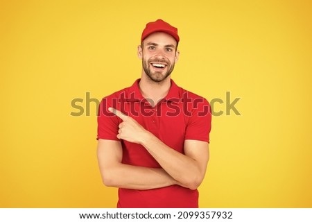 Special offer copy space. Shop worker. Handsome guy cashier. Staff wanted. Supermarket cashier. Man delivery service wear red cap. Shop assistant. Food order delivery man. Cashier occupation Royalty-Free Stock Photo #2099357932