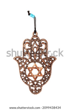 Metal hamsa for blessing isolated on white background