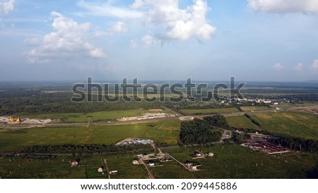Views from the drone to the forest, park area Royalty-Free Stock Photo #2099445886