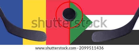 Top view hockey puck with Romania vs. Sudan command with the sticks on the flag. Concept hockey competitions