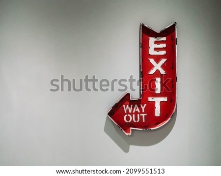 Exit sign. End of crisis concept.