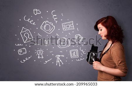 Young photographer girl shooting photography icons