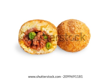 Two Arancini Italian rice balls or croquettes coated with bread crumbs, deep fried and stuffed with minced beef meat in tomato sauce and green peas isolated on white background, halved and whole one Royalty-Free Stock Photo #2099691181
