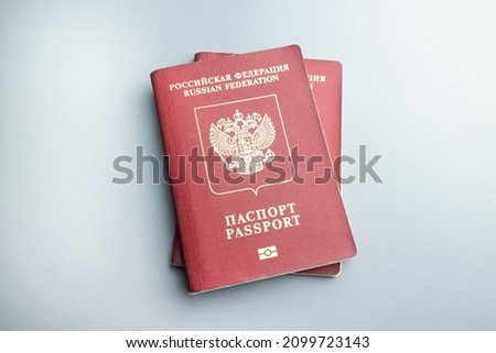 2 russian pasports on grey background Royalty-Free Stock Photo #2099723143
