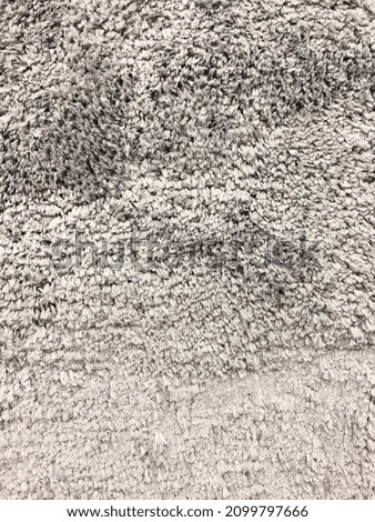 Grey texture background Fabric carpet for bathroom interior 