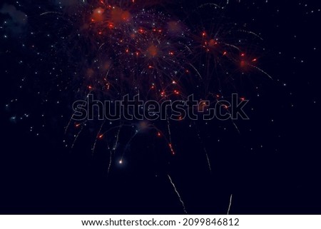 fireworks display at night skies with colorful lights and falling sparks