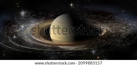 Saturn planet with rings in outer space among star dust and srars. Elements of this image furnished by NASA Royalty-Free Stock Photo #2099883157